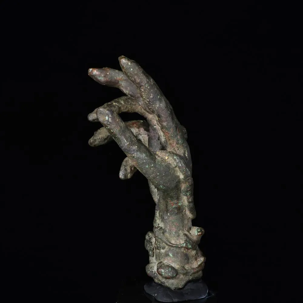 A Roman Bronze hand of Sabazios, Roman Imperial Period, ca. 2nd - 3rd century CE